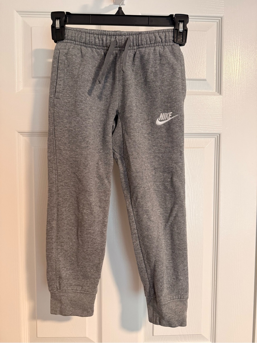 Nike Grey Kids Fleece Joggers with White Swoosh